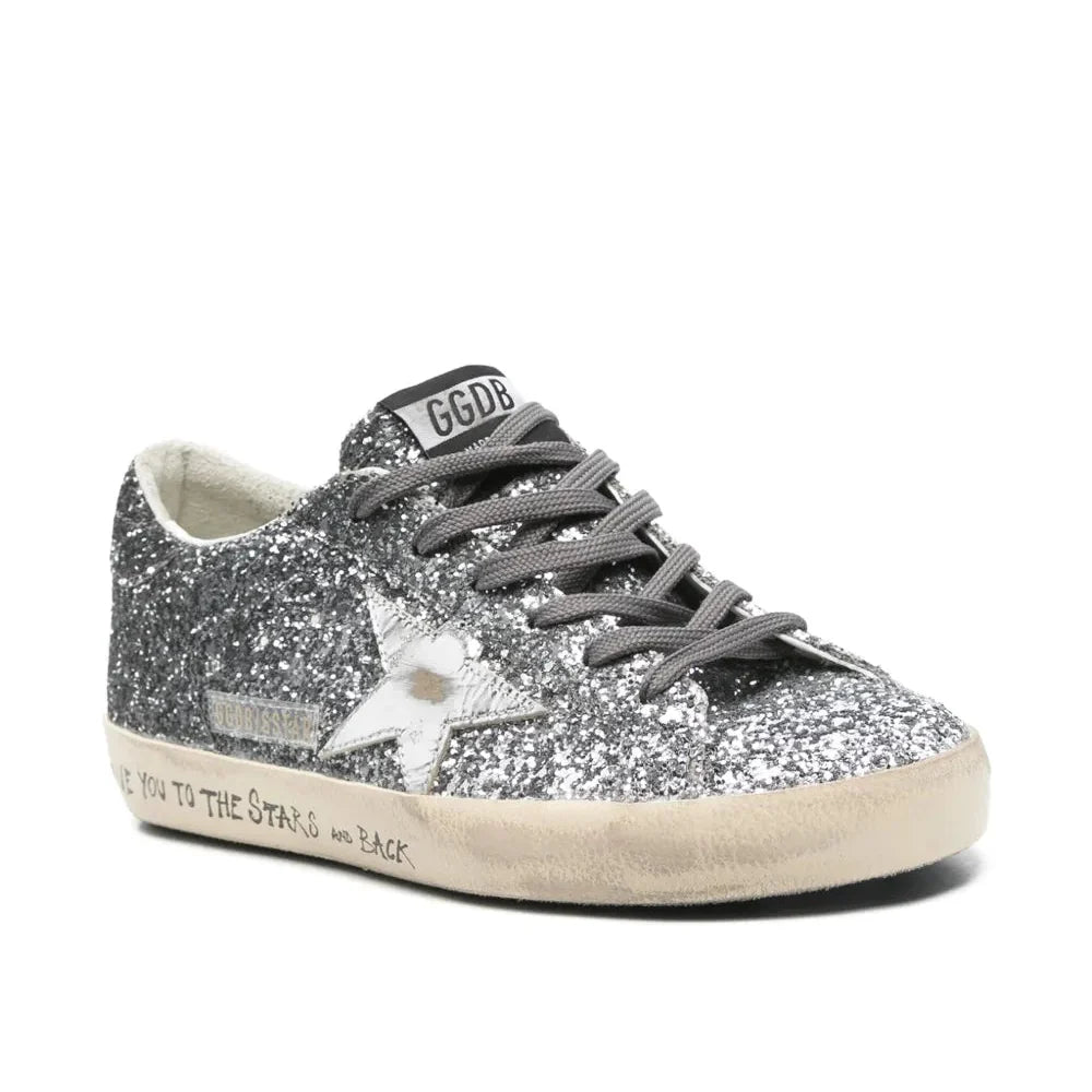 Golden Goose Super Star trainers with glitter upper and silver metallic leather star